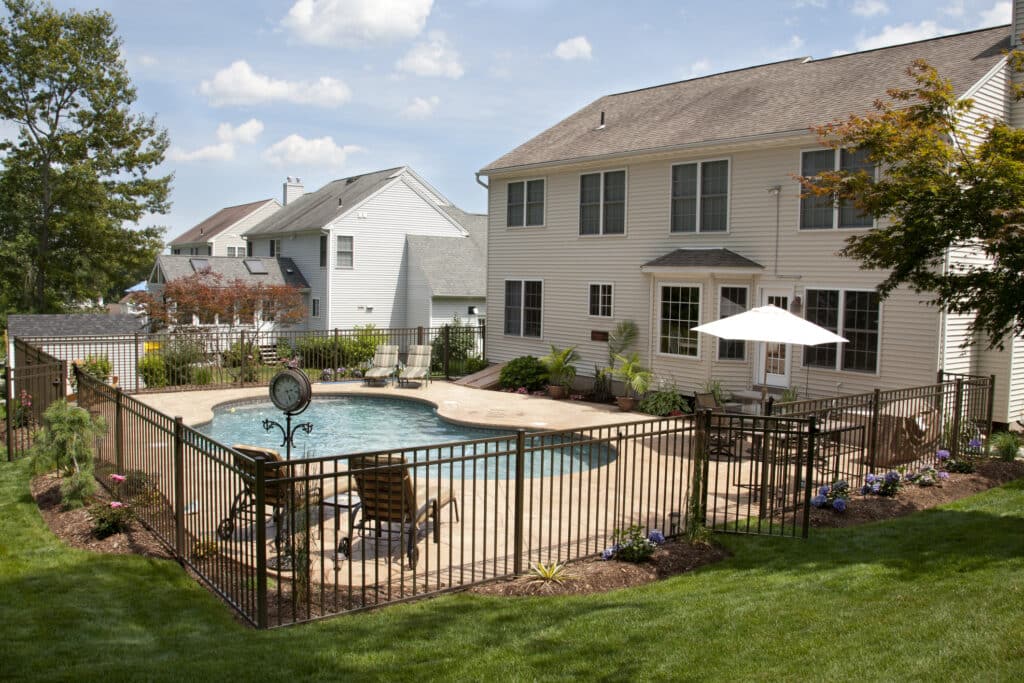 residential backyard with aluminum fence installed by Basic Fence in Indianapolis