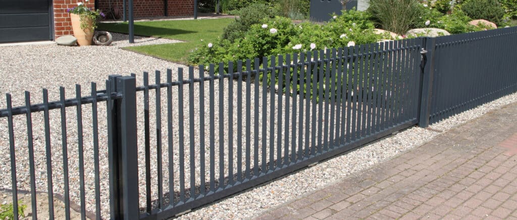 drive way with aluminum fence installed in indianapolis
