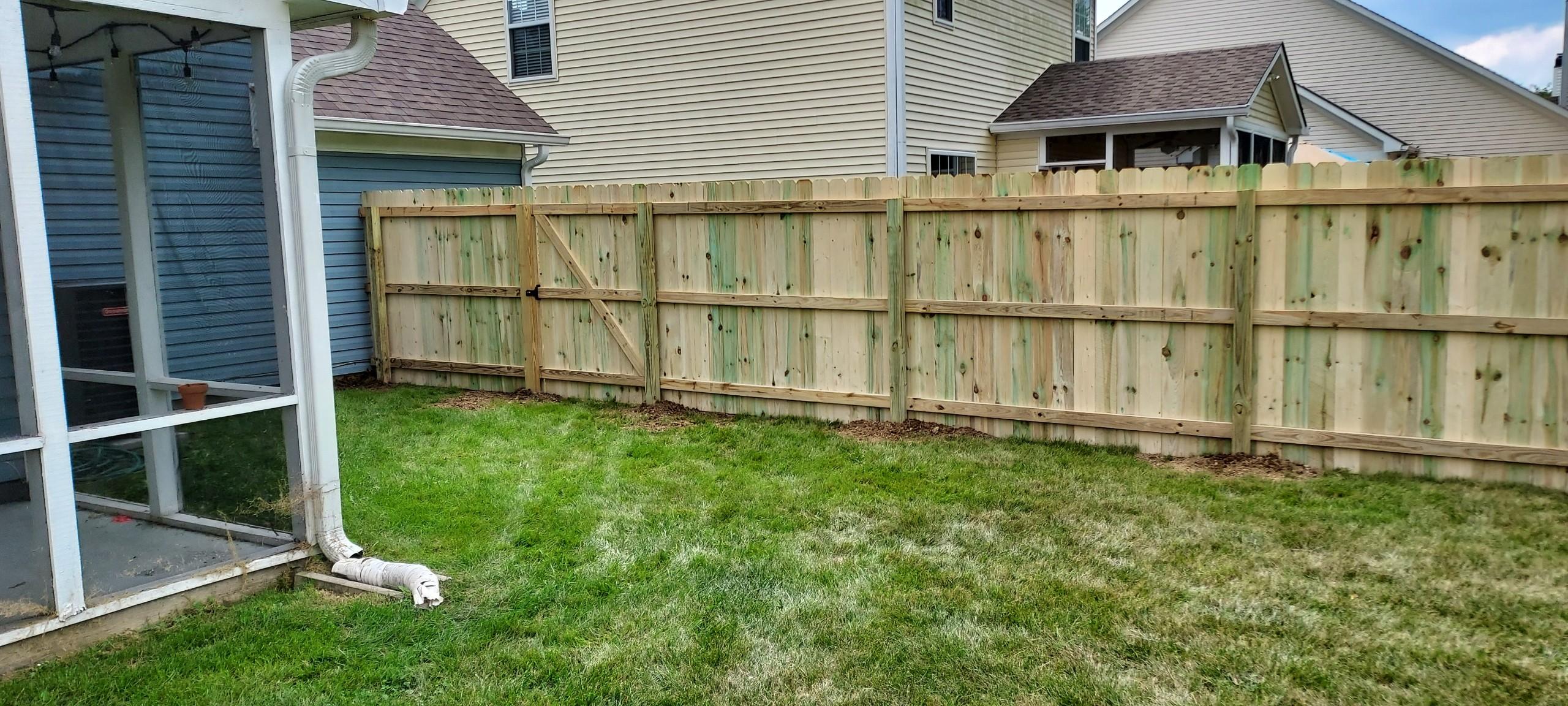 residential and commercial wooden gate installation in Indianapolis